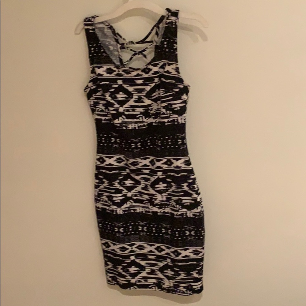 Black and white dress with detail on upper back.